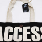 Nomad Sari Iconic Classic -kangaskassi – ACCESS ALL AREAS – musta ja luonnonvärinen, 10 oz